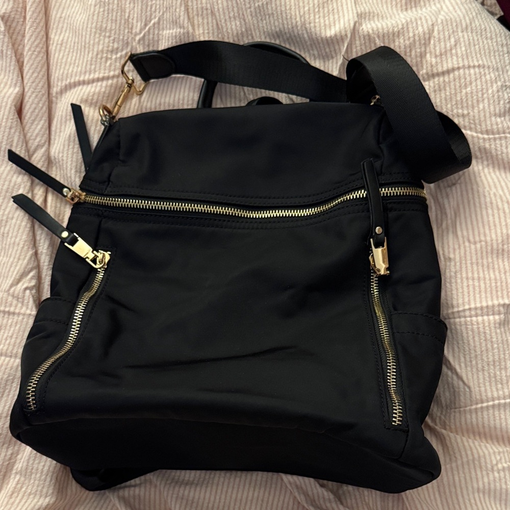 Black Backpack with Gold Accents